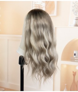 Ashen Glow Blonde: A cool, ashy blonde with dark roots fading into soft, silvery blonde ends.