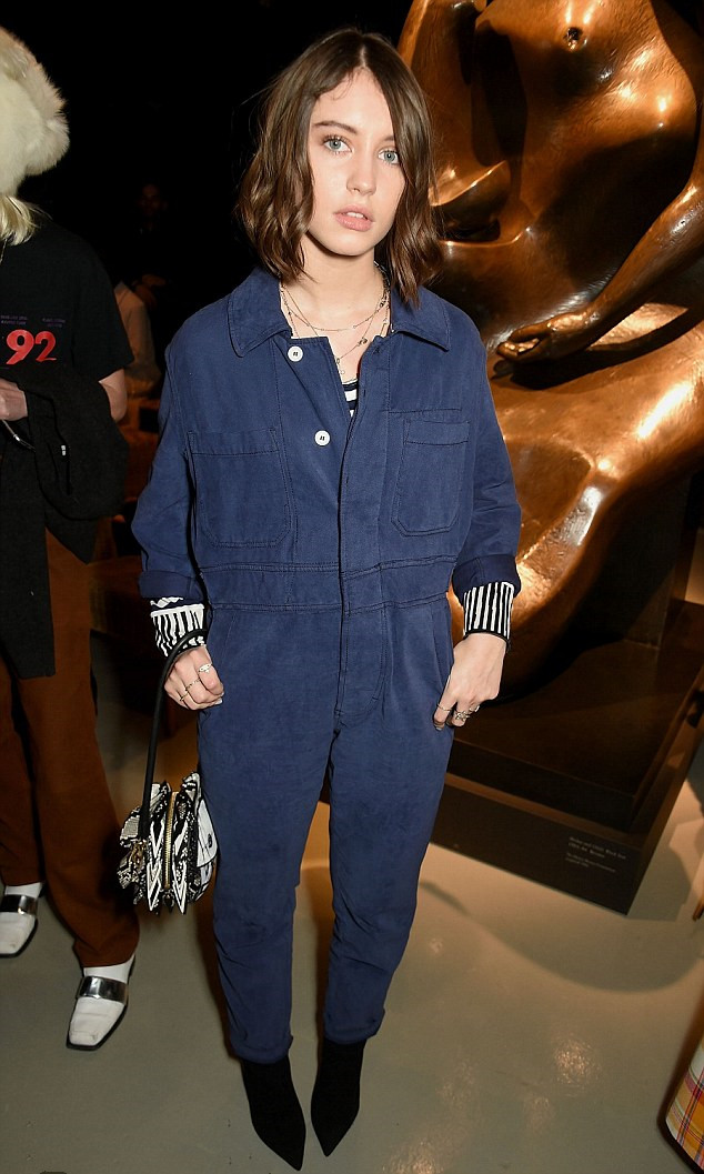 Iris Law' Inspiration rocking a navy blue jumpsuit