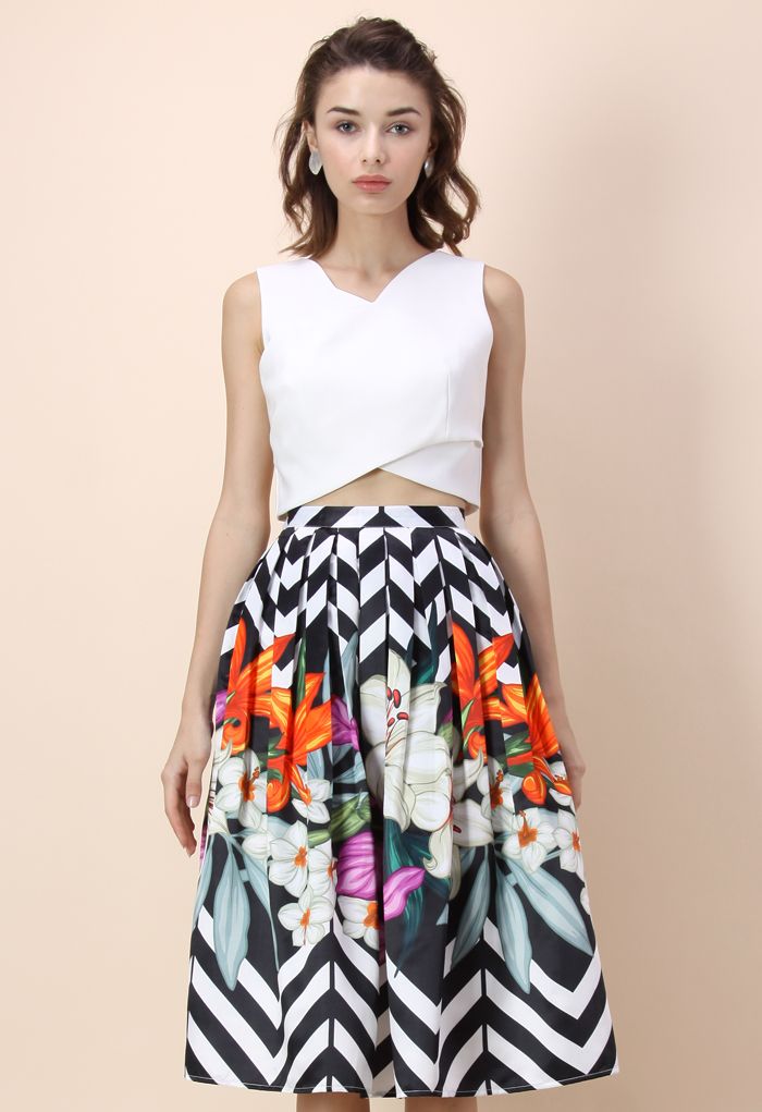White top with multi-colored pleated skirt